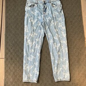Blue jeans with white butterfly’s